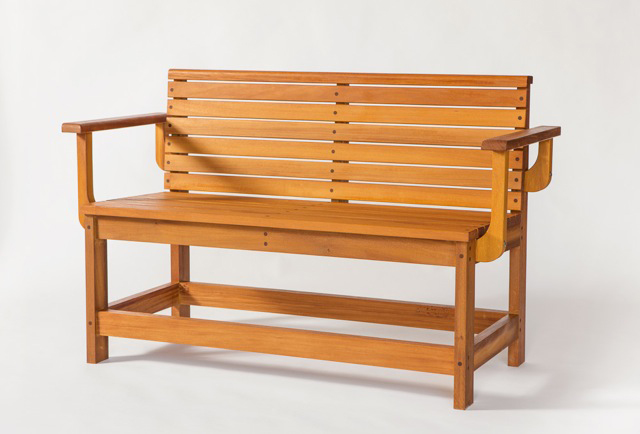Mahogany bench built from lumber recycled from a construction site.