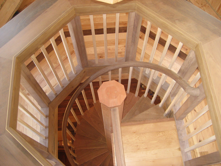 Looking from above down a spiral which has a surrounding octagonal landing.